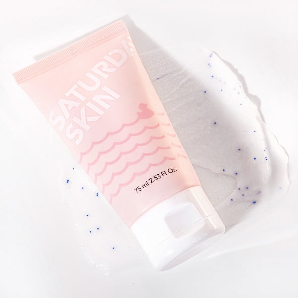 Pink skincare product packaging with text on a white background