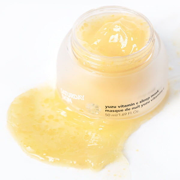 Yuzu vitamin C sleep mask jar with yellow mask on a white background