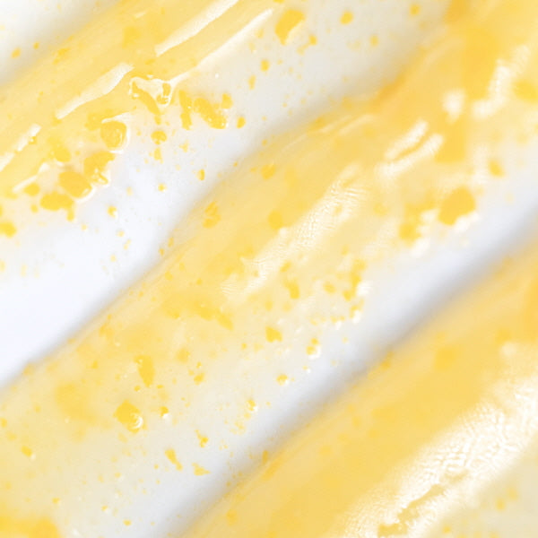 Close-up of yellow and white textured mask